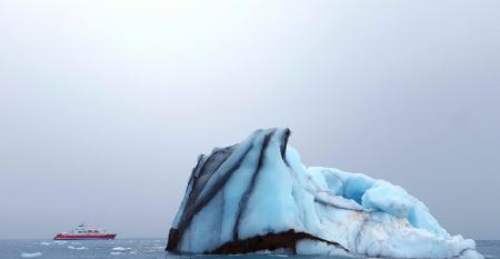MV Expedition & iceberg (photo - AECO)